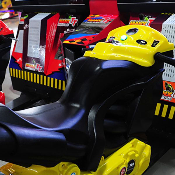 Coin-Operated Racing Motorcycle Arcade Machine with Realistic Controls and Immersive Graphics