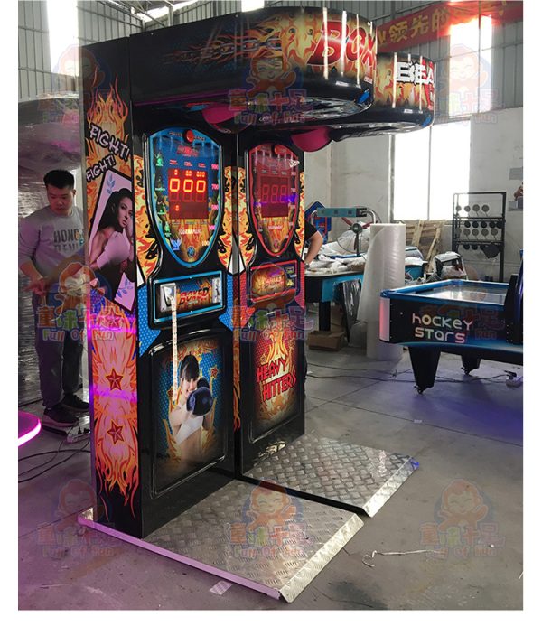 A robust coin-operated boxing arcade game machine designed specifically for adults. The machine features eye-catching graphics, a padded punching bag, and a digital display for scoring. Ideal for bars, clubs, arcades, and adult entertainment centers, it offers a challenging and competitive experience for adult players.