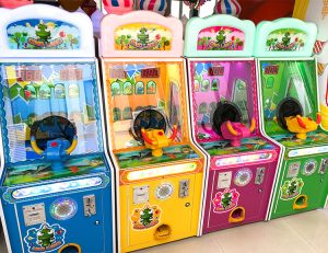 A colorful coin-operated Dinosaur Paradise Children's Ball Shooting Game designed for kids. The machine features vibrant dinosaur graphics, a user-friendly interface, and interactive ball shooting gameplay. Ideal for arcades, family entertainment centers, and playrooms, it offers a fun and engaging experience for young players.