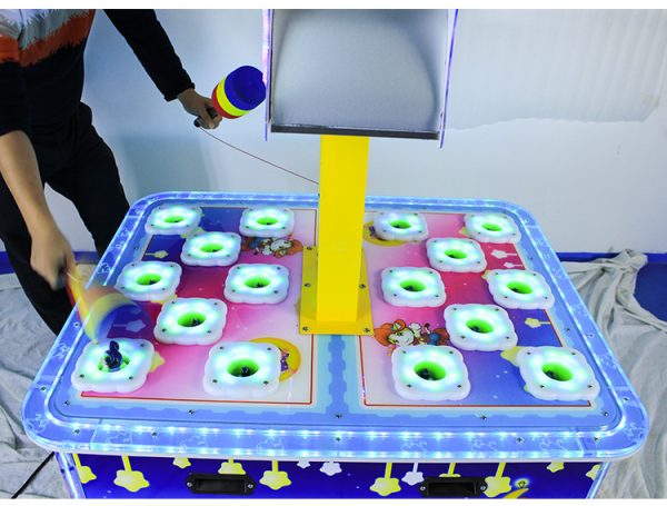 A colorful coin-operated Children's Two-Player Whack-a-Mole Game designed for kids. The machine features vibrant graphics, a user-friendly interface, and interactive whack-a-mole gameplay. Ideal for arcades, family entertainment centers, and playrooms, it offers a fun and engaging experience for two young players.