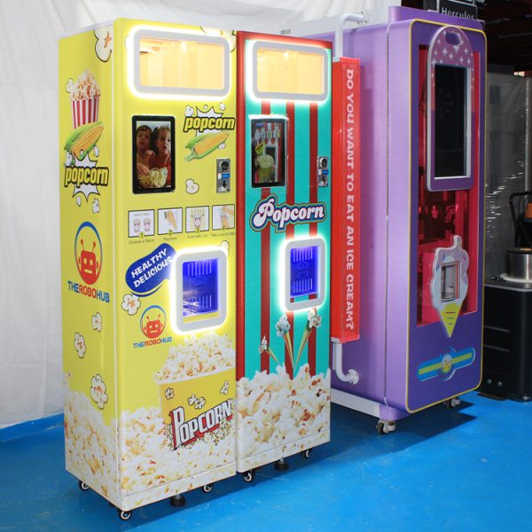 Large commercial popcorn machine in a concession stand, popping fresh popcorn.