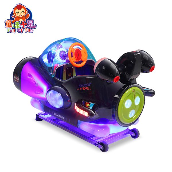 Colorful spaceship-themed kiddie ride designed for children, featuring vibrant lights and sound effects