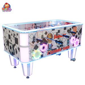 Coin-operated table football machine for kids and adults, perfect for arcades and entertainment venues.