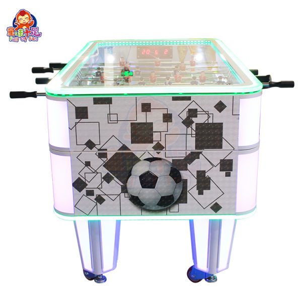 Coin-operated table football machine for kids and adults, perfect for arcades and entertainment venues.