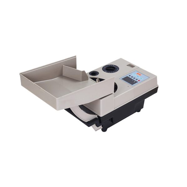 A high-speed coin counting machine efficiently sorting and counting coins.