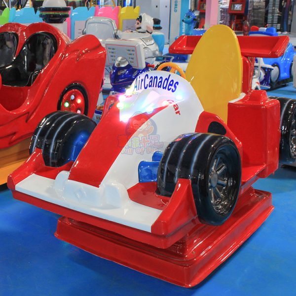 Colorful airplane racing kiddie ride, designed for children with fun graphics and safety features.