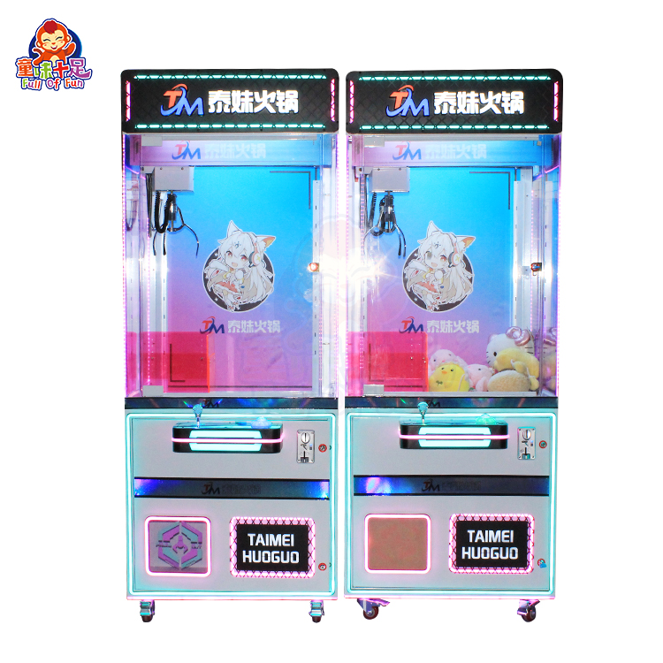Colorful transparent claw machine with prizes inside, designed for arcades and entertainment venues.