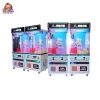 Colorful transparent claw machine with prizes inside, designed for arcades and entertainment venues.