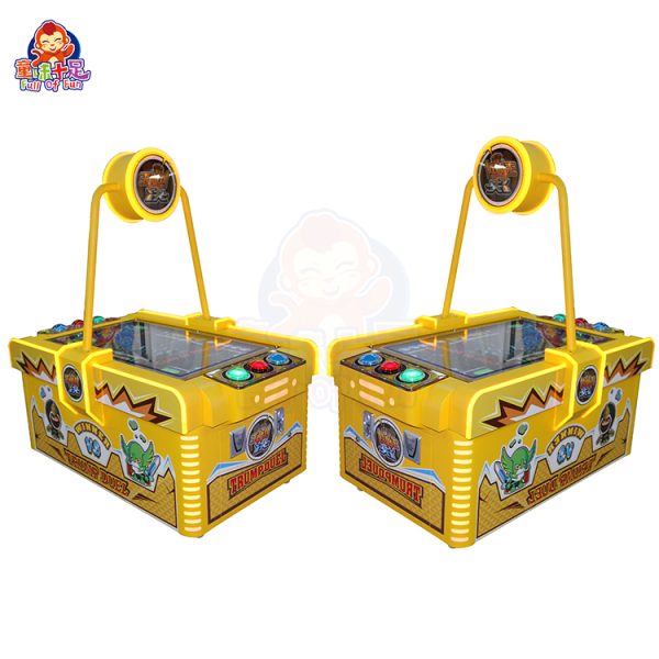 Kids playing a dual-player video soccer game.