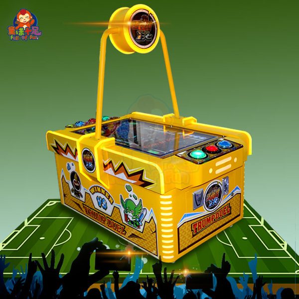 Kids playing a dual-player video soccer game.