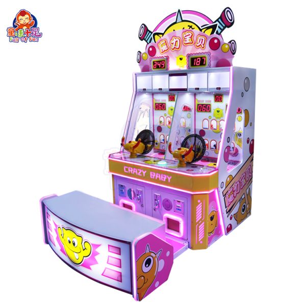 Child playing with the Magic Baby ball-shooting game machine in a colorful arcade.