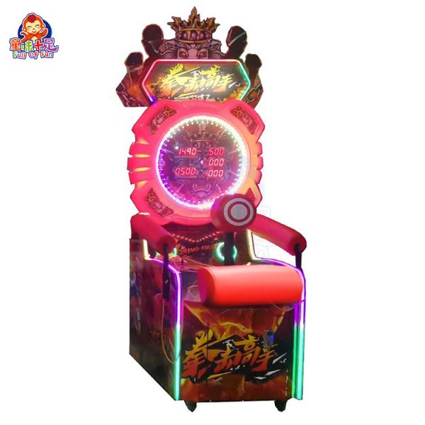 A coin-operated boxing machine with a punch bag, displaying scores and lights.