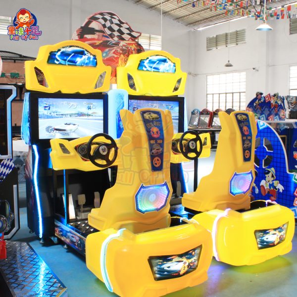 Two-player arcade racing game machine with dual seats, steering wheels, and colorful LED lights.