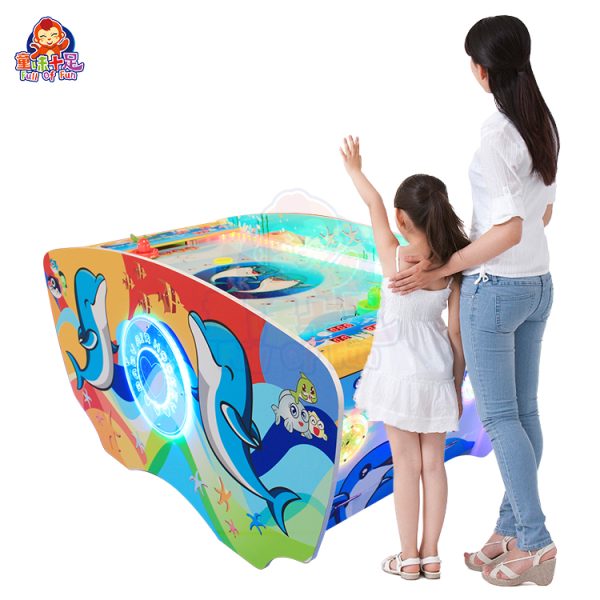 Children playing on a coin-operated dual-player air hockey machine.