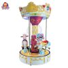 A colorful, coin-operated three-seater carousel ride for kids.