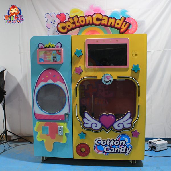 Large commercial cotton candy machine with stainless-steel bowl, perfect for events and fairs.