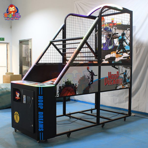 Coin-operated LED basketball machine with lights for arcade use.