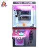 Compact coin-operated mini claw machine for children’s amusement.