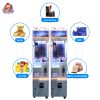 Mini claw machine with coin-operated function, bright LED lights, and compact design.