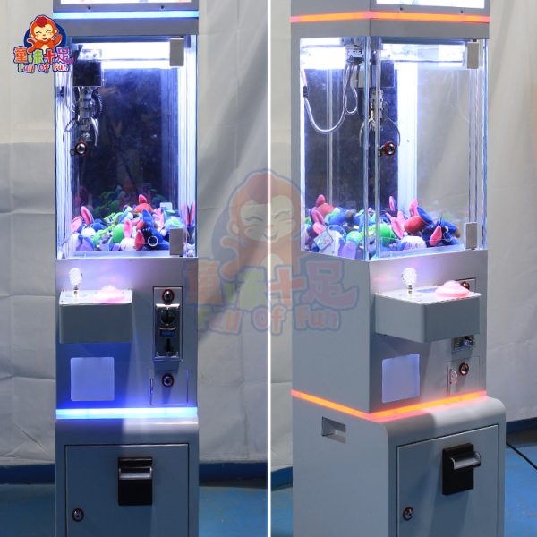 Mini claw machine with coin-operated function, bright LED lights, and compact design.