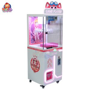 Pinkfarbener Greifautomat mit drehbaren Klammern, bunten Lichtern und ausgestellten Preisen, perfekt für Familienunterhaltungsstätten.