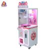 Pink Prize Claw Machine with rotating clamps, colorful lights, and prizes on display, perfect for family entertainment venues.