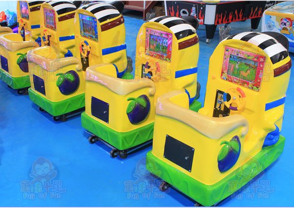 Minion-themed kiddie ride with bright colors, lights, and sounds, designed for young children’s entertainment.