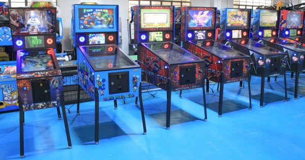 Custom pinball machine with ultra-high-definition LED screens and dynamic RGB lighting, designed for arcade and entertainment venues.