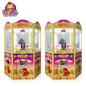 Golden House 6-player arcade coin pusher machine with LED lights and multiplayer coin-drop gameplay.