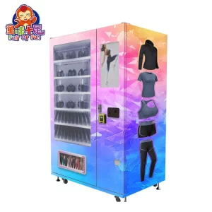 Máquina expendedora de ropa moderna con almacenamiento segmentado por tallas y pantalla táctil HD.